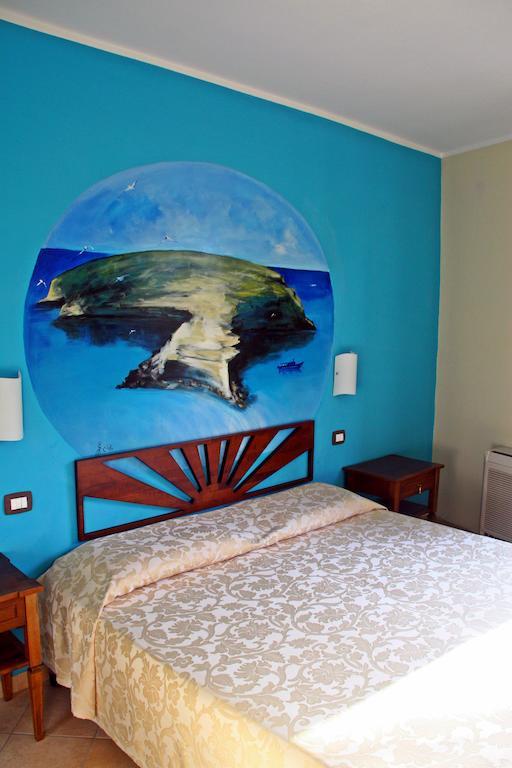 Puesta De Sol Residence LMP Habitación foto