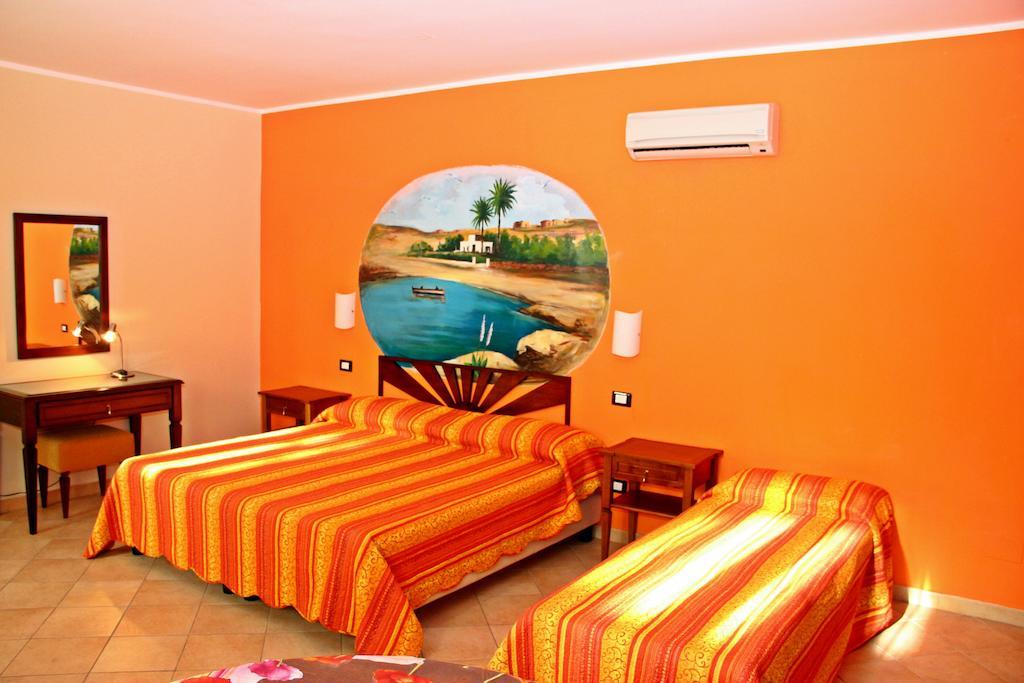 Puesta De Sol Residence LMP Habitación foto